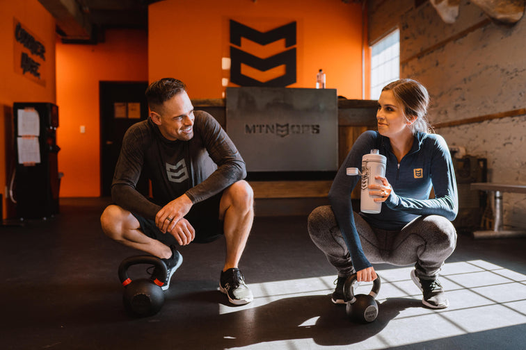 Train Inside. Man and woman prepping for training