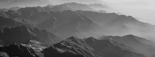 Footer background image. Picture of a mountain in grayscale